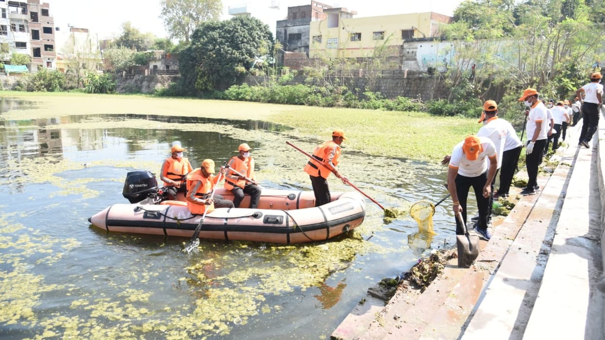 NDRF remove Algae and hyacinth from Pushkar pond in varanasi