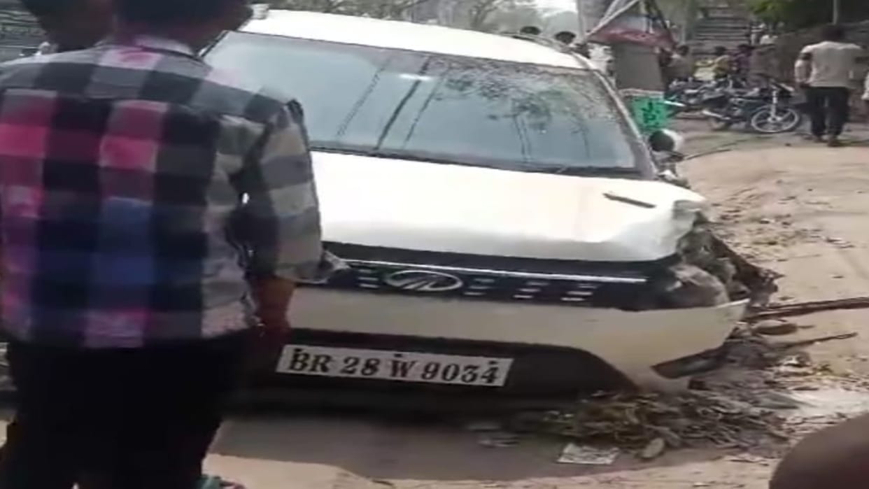 A car rider hits a middle-aged man going to the market.