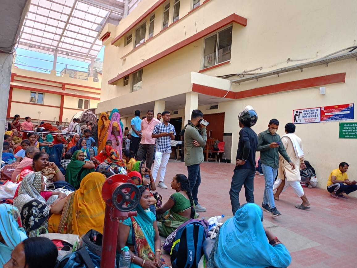 BHU hospital emergency beds full queue of stretchers outside gate