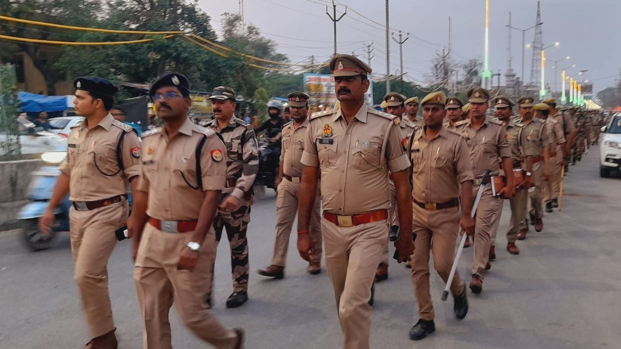 Route march by SP mau for aware public in Lok Sabha elections