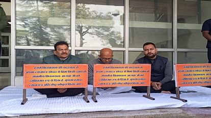 Three independent MLAs sitting on strike outside the Assembly Speaker's Chamber