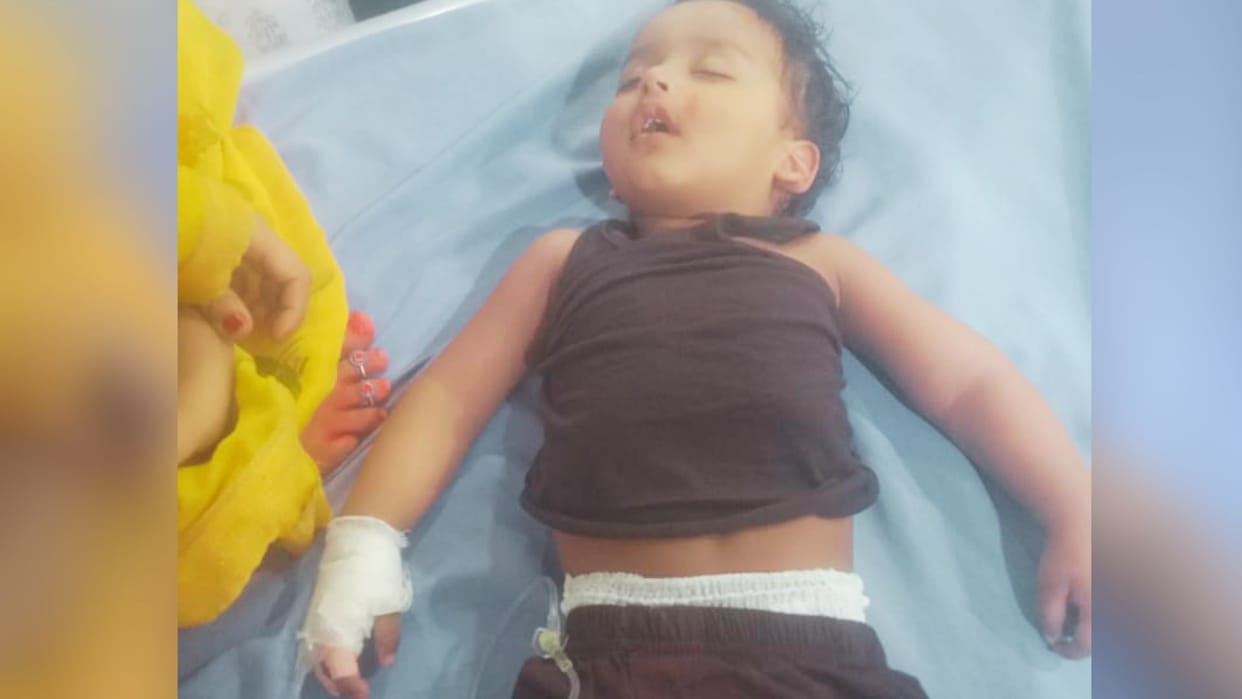 child sitting in mother lap fell 30 feet due to auto collision in varanasi