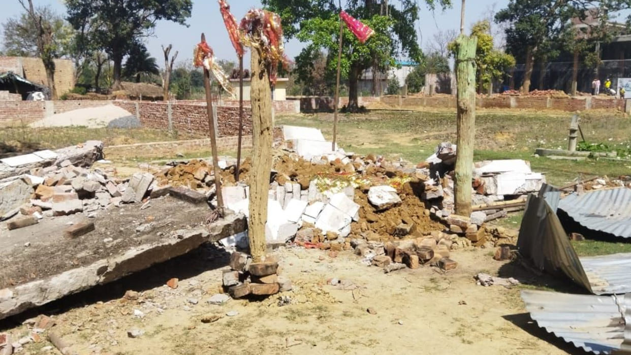 Uproar over demolition of tomb, bricks and stones pelted