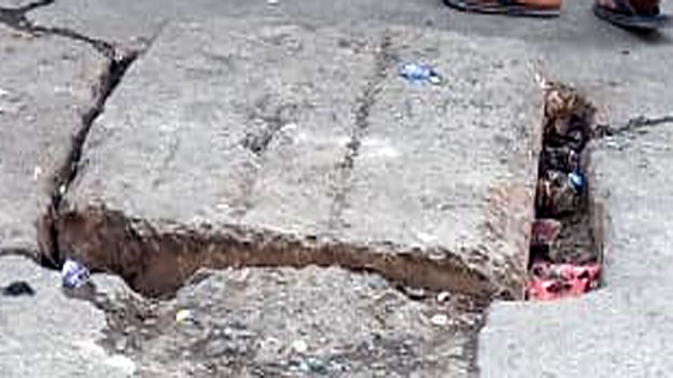 Covered city open manholes