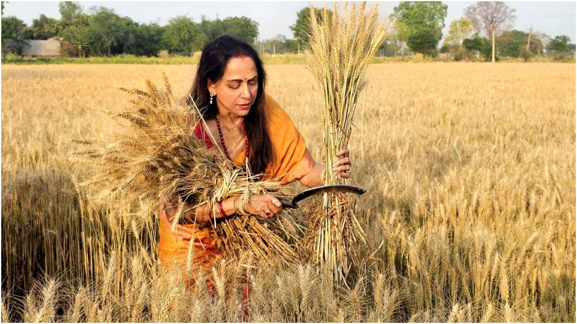 BJP MP and candidate of Mathura constituency Hema Malini meets farmers during poll campaign