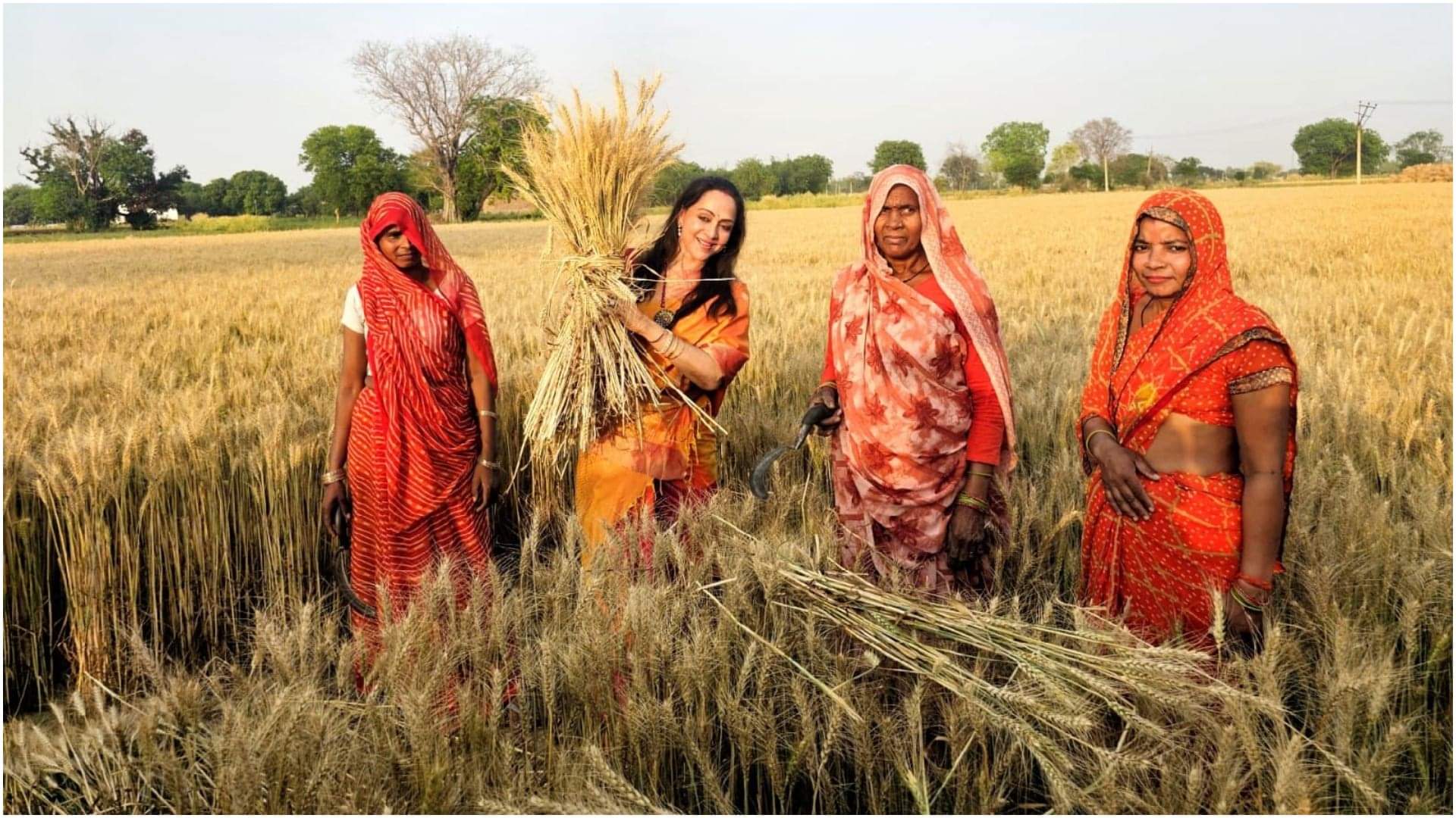 BJP MP and candidate of Mathura constituency Hema Malini meets farmers during poll campaign