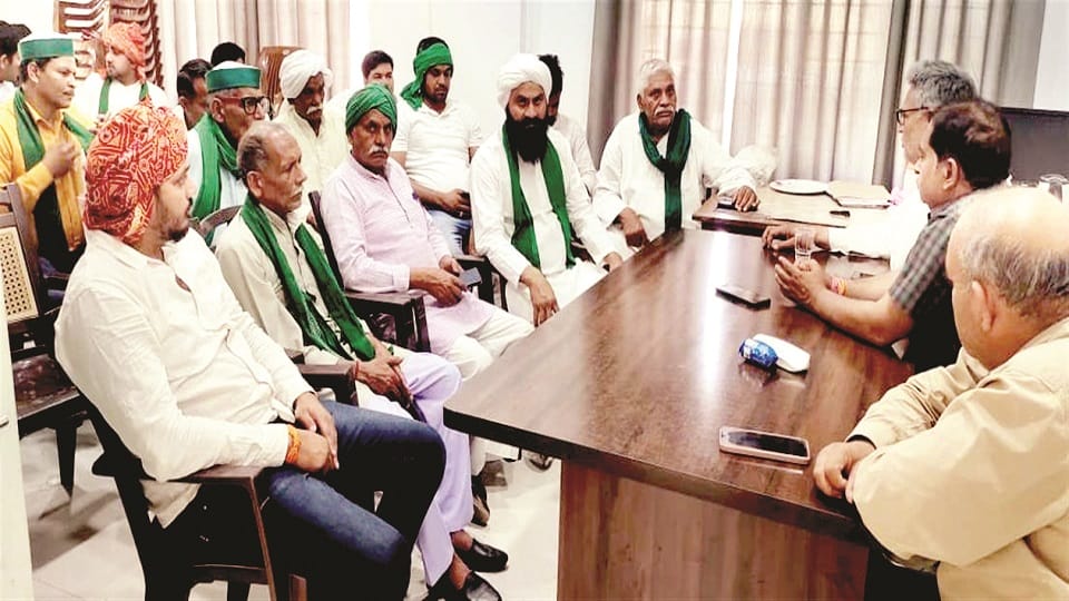 Farmers angry over ban on wheat purchase by middlemen blocked the road