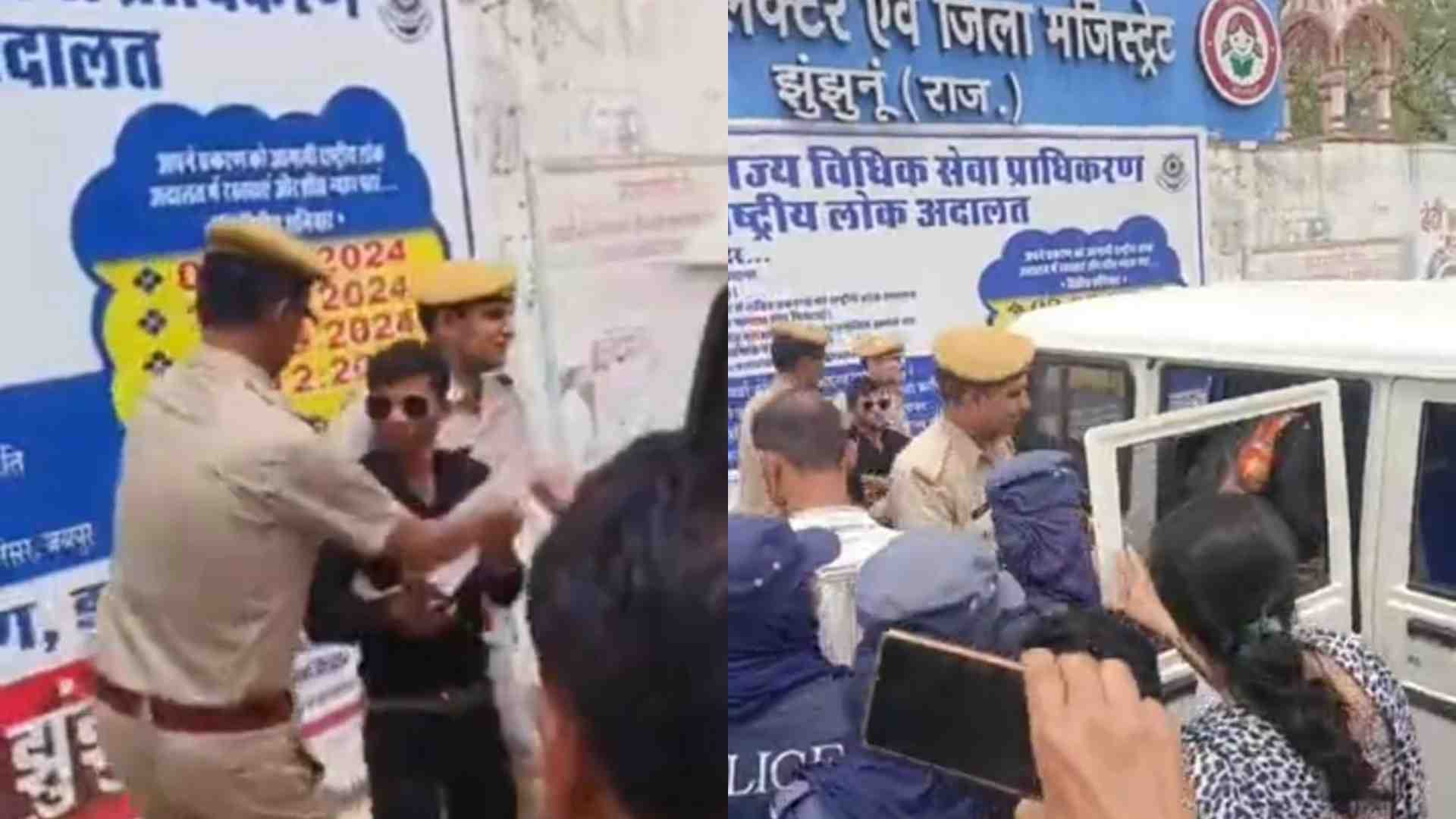 पुलिस से उलझते कार्यकर्ता।