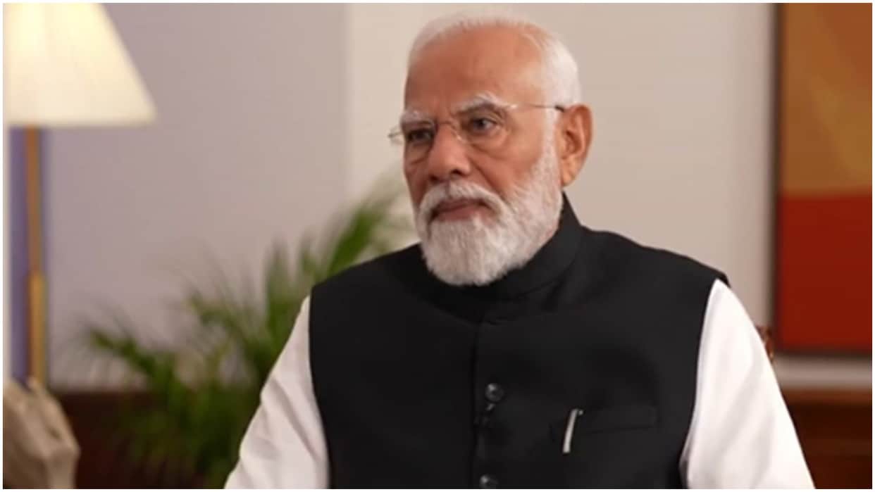 Prime Minister Narendra Modi reacts to an AI video on him