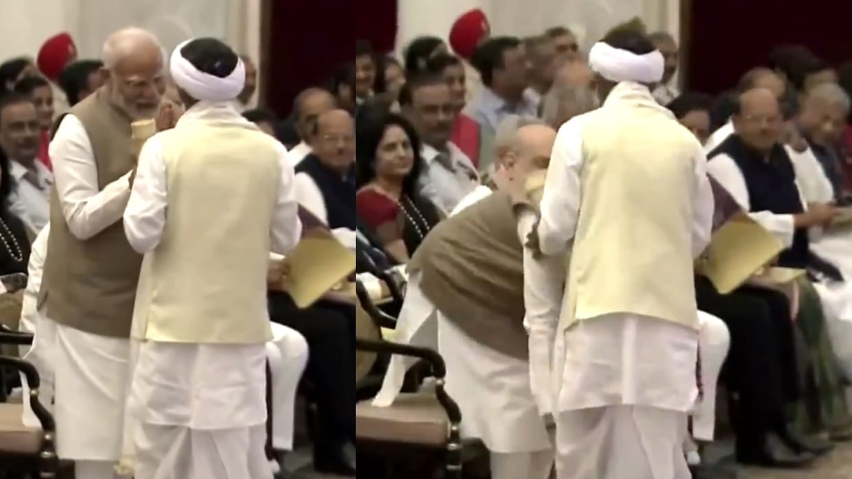 PM Modi touching padma shri drona bhuyans feet heartwarming video