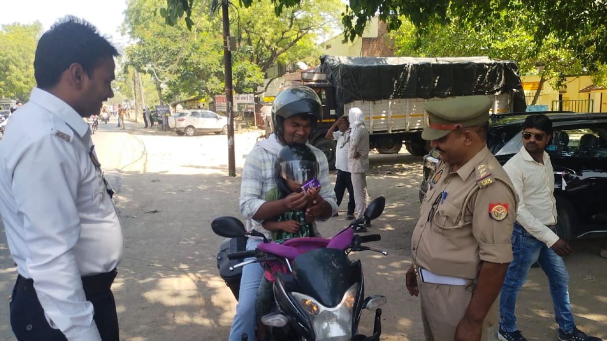 child also wore a helmet with the father in mau