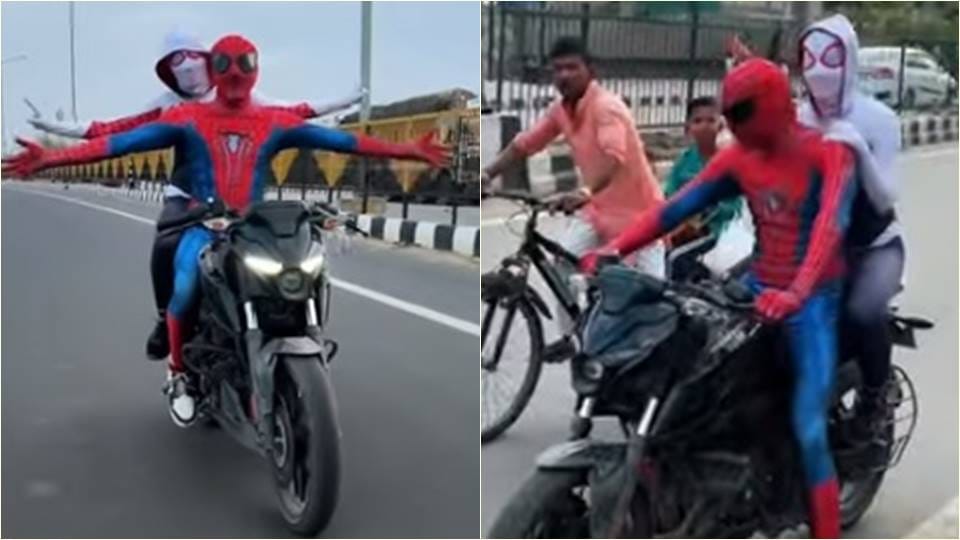 Boyfriend and girlfriend dressed as Spiderman and rode their bike on the streets of Delhi
