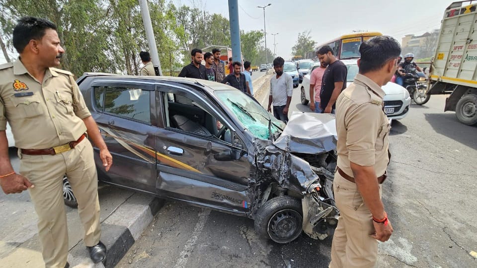 Due to the collision with bus car got stuck on the divider after taking two rounds in ghaziabad