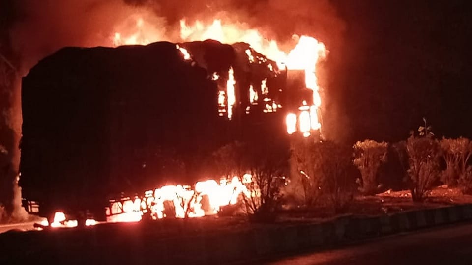 Truck loaded with paddy caught fire due to wheel blast