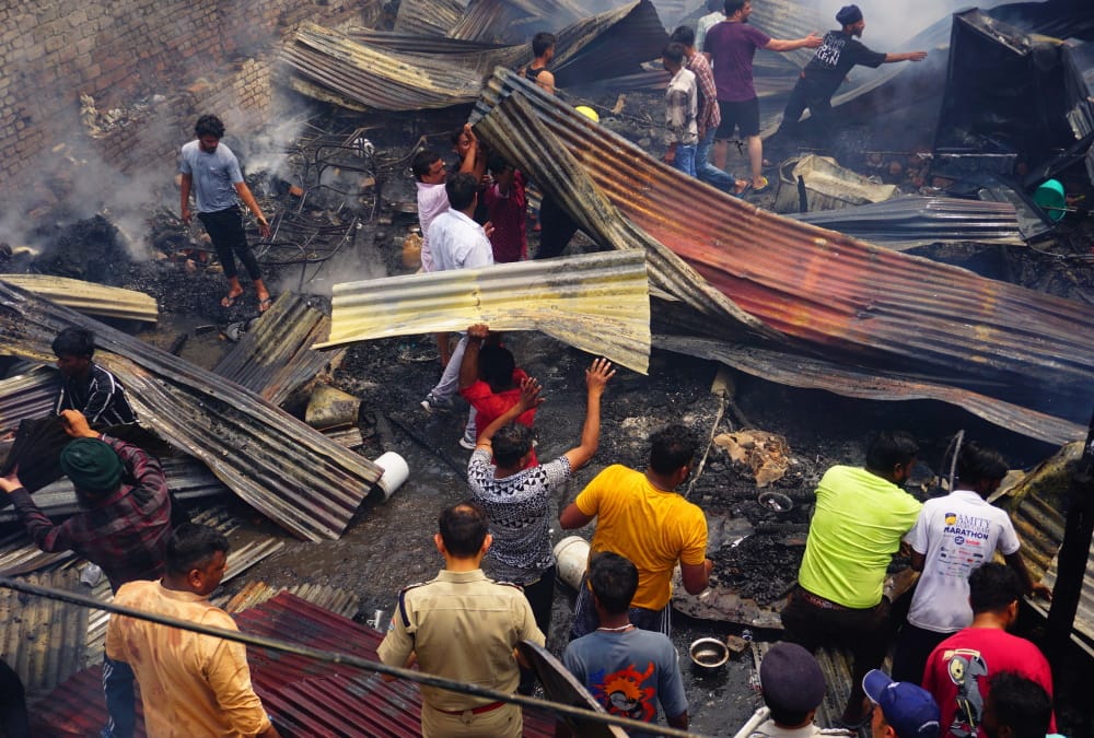 Uttarakhand Massive Fire Incident in Dehradun Basti after eight Cylinder Blast Photos
