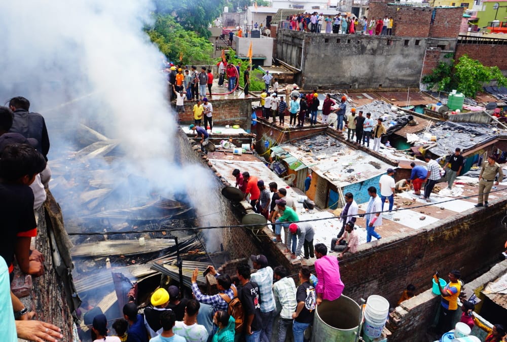 Uttarakhand Massive Fire Incident in Dehradun Basti after eight Cylinder Blast Photos