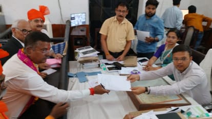 Lok Sabha Election: BJP candidates Praveen Patel and Neeraj Tripathi filed nomination, arrived with procession