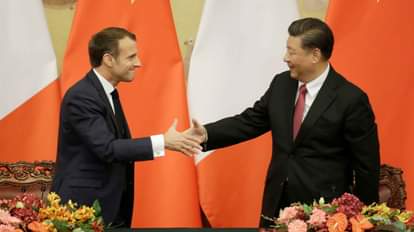 शी जिनपिंग और इमैनुएल मैक्रों हाथ मिलाते। (फाइल फोटो)