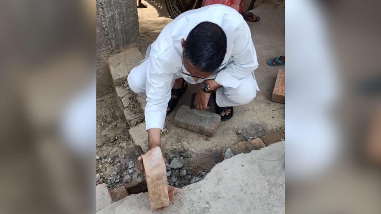 RCC road under construction started breaking after hitting with brick in mau