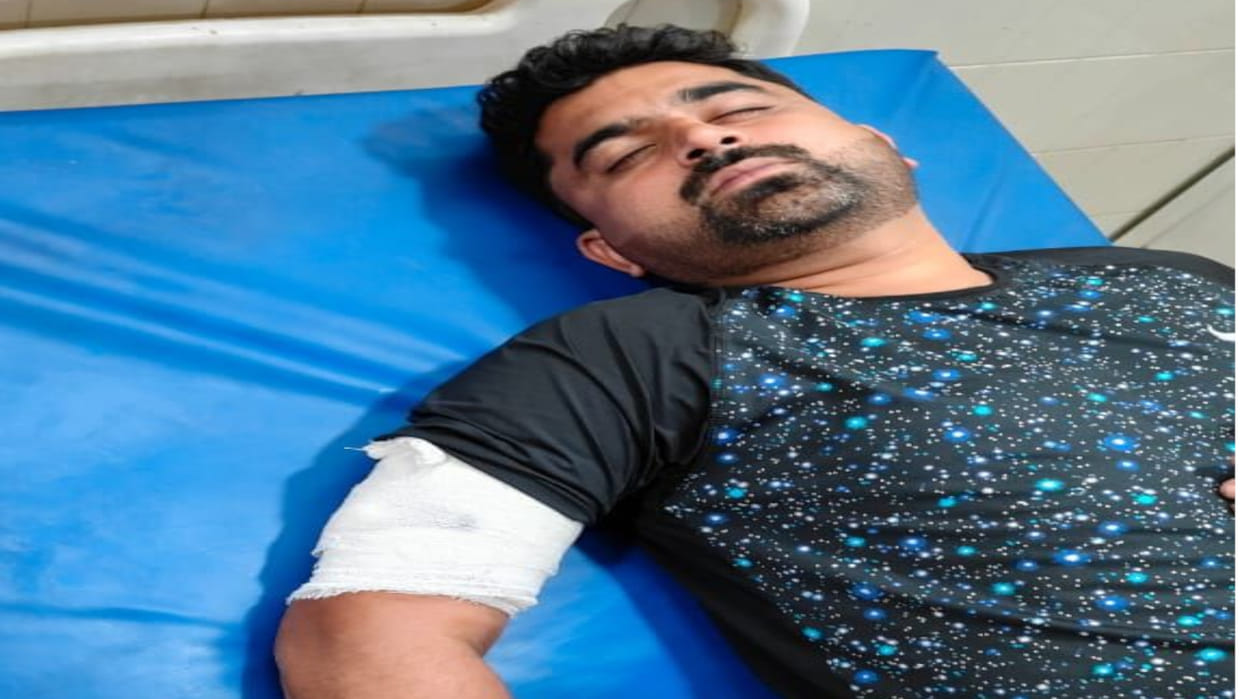 A guard in Basti opened fire on a colleague's son in a dispute