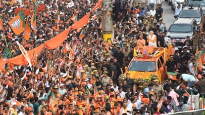 Lok sabha election hamar kashi hamar modi pm road show in varanasi yogi adityanath