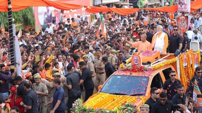 Lok sabha election hamar kashi hamar modi pm road show in varanasi yogi adityanath