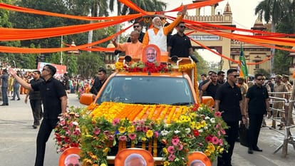 Lok sabha election hamar kashi hamar modi pm road show in varanasi yogi adityanath