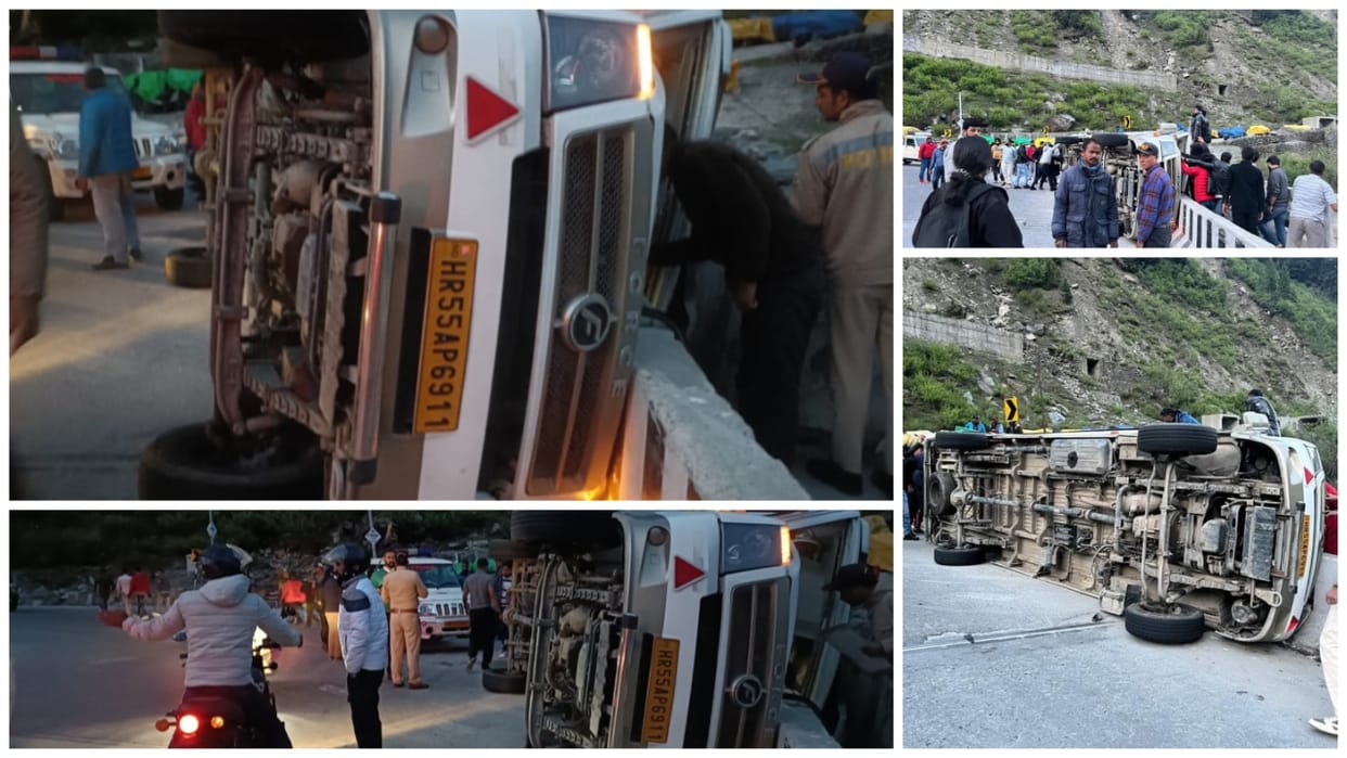 Traveler vehicle overturns on the road in Dhundi on Manali-Keylong road