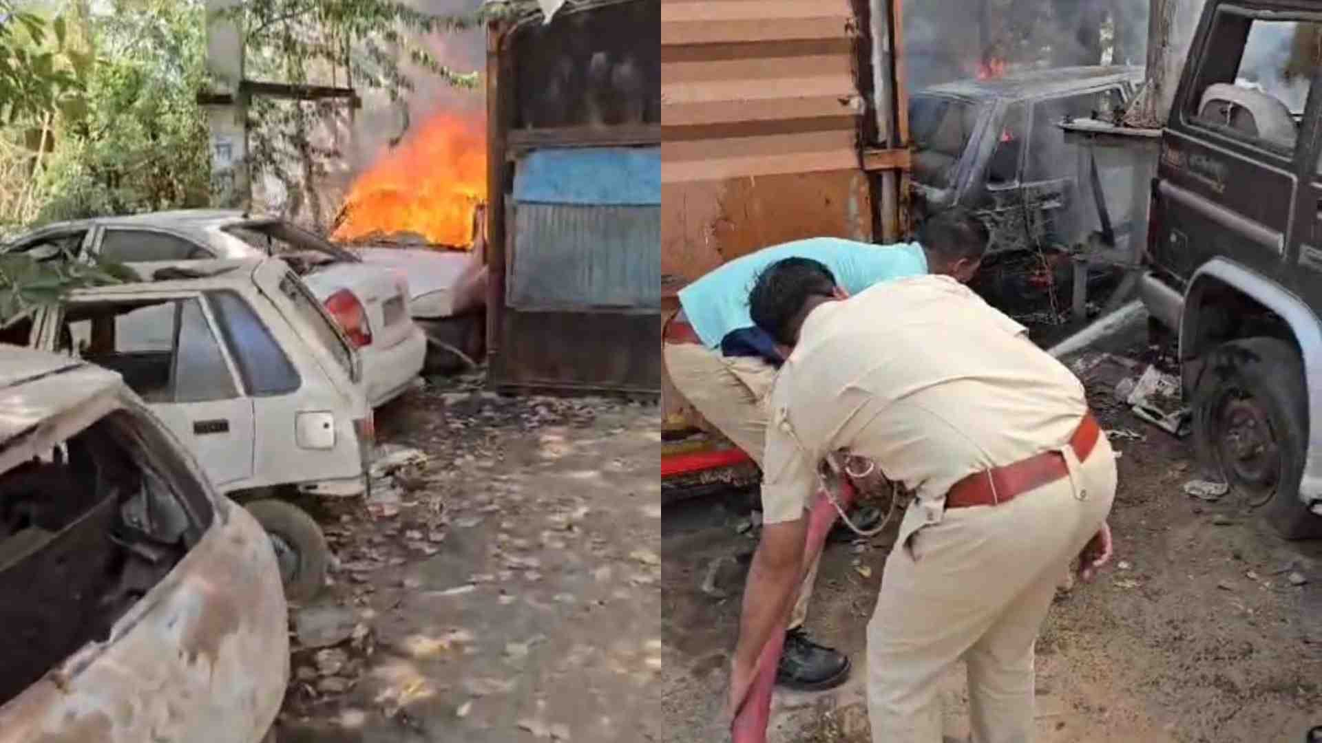 कार में लगी आग को बुझाते पुलिसकर्मी।