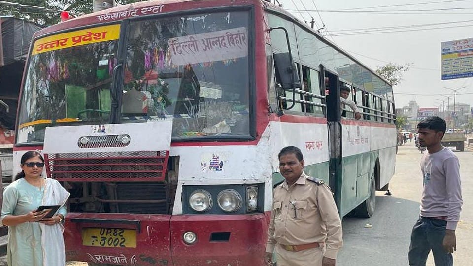 Two buses painted in roadways bus colors were caught