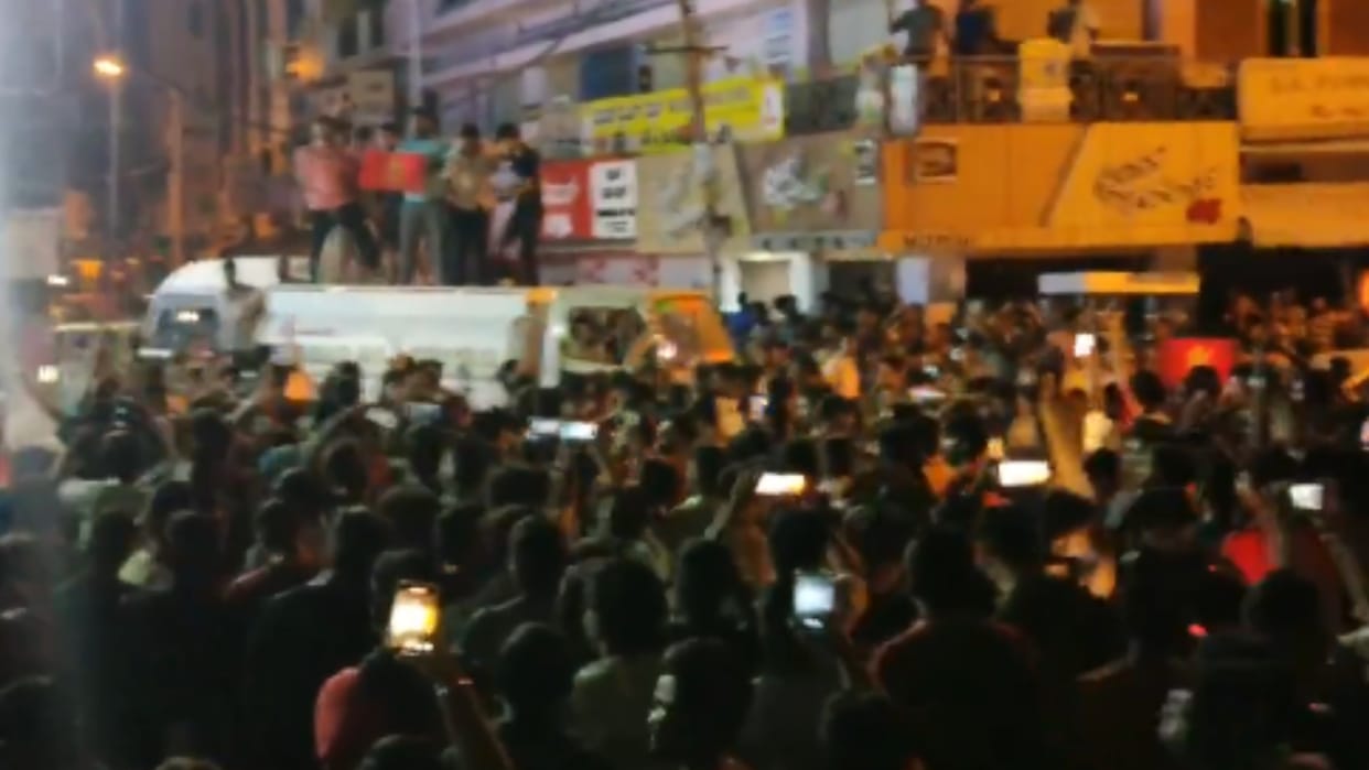 IPL 2024 Rcb win over csk Bengaluru residents block roads, dance, burn crackers in celebration