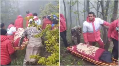 राहत-बचाव दल दुर्घटना वाली जगह से मृतकों के शव निकालते