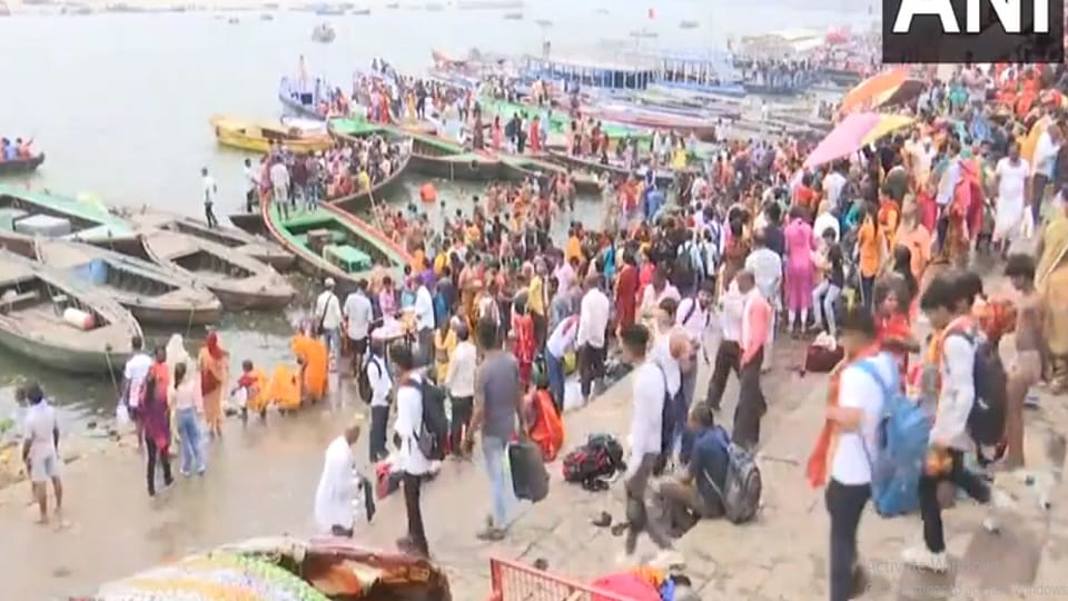 Varanasi, UP: Devotees take holy dip in Ganga River on the occasion of Buddha Purnima.