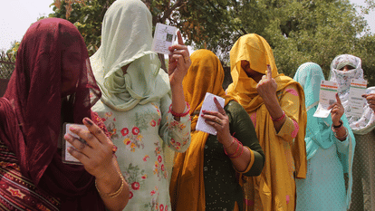 women voters at the polling booth in veil and some in burqa adhi abadi in delhi
