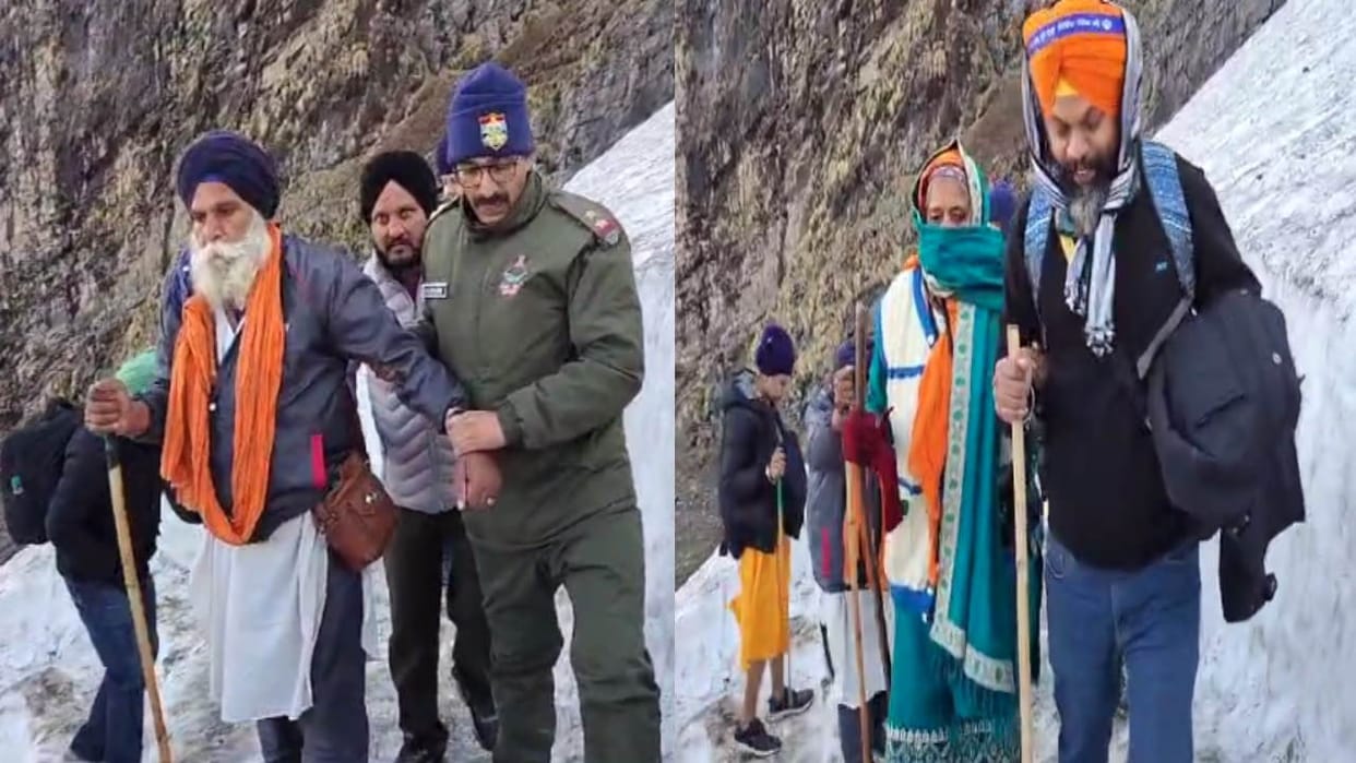 Hemkund Sahib Devotees moving forward holding hands on the icy slippery path Watch Photos