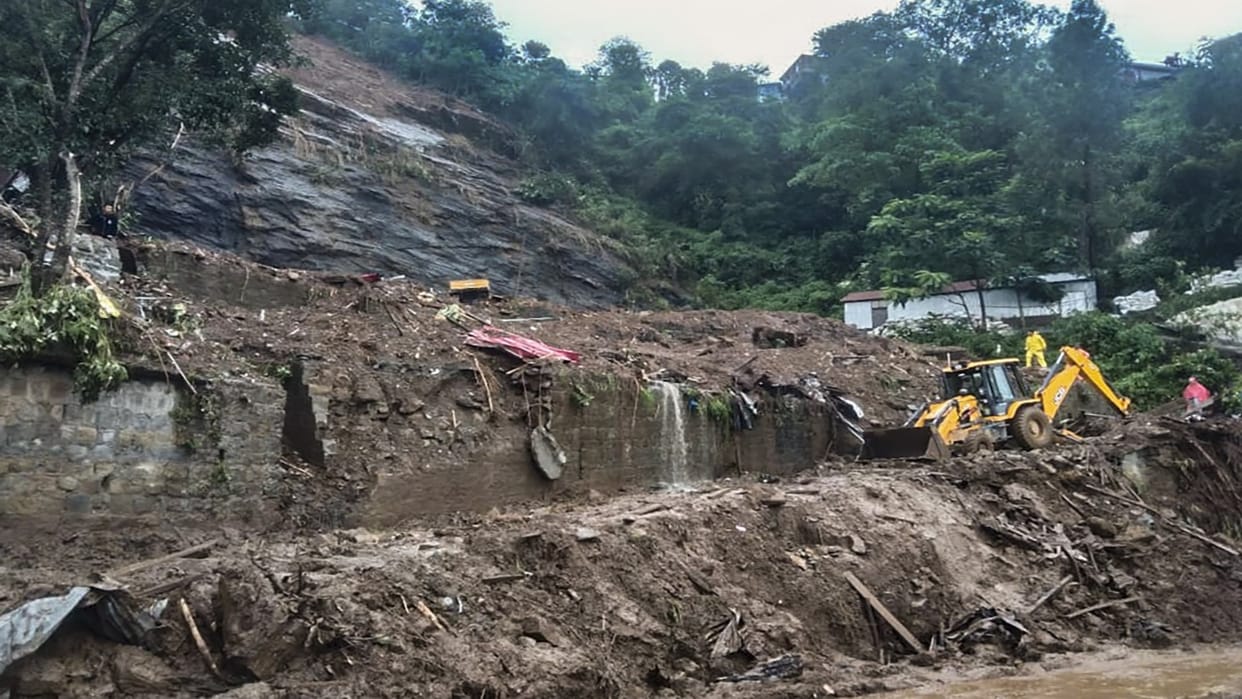 Indonesian rescuers search for nearly three dozen people after landslides killed several people