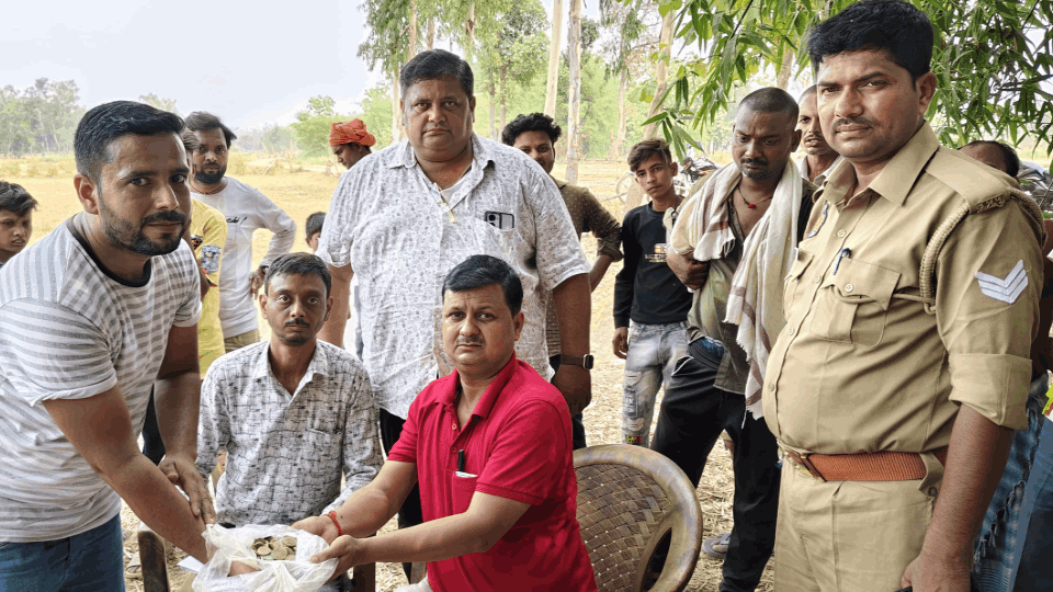 Many coins with Urdu-Persian words found in a field in Sant Kabir Nagar
