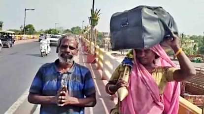 दंडवत यात्रा पर निकले प्रहलाद और उनकी पत्नी।