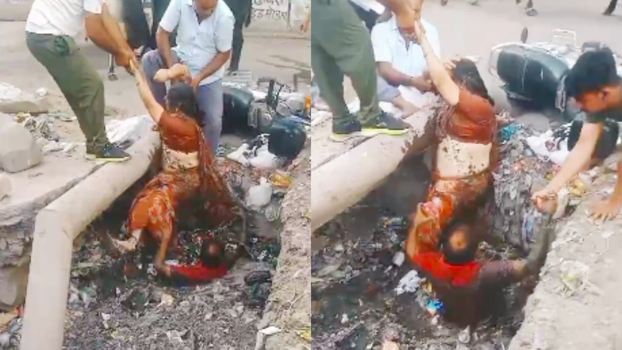 Pali Former chairperson fell into drain husband jumped to save her bike lost balance due to bulls fighting
