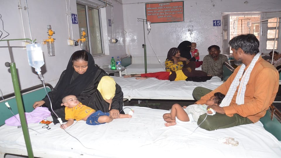 Children writhing with vomiting and diarrhoea