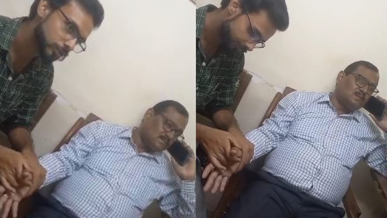 video of officer getting massage from a man goes viral in Bareilly