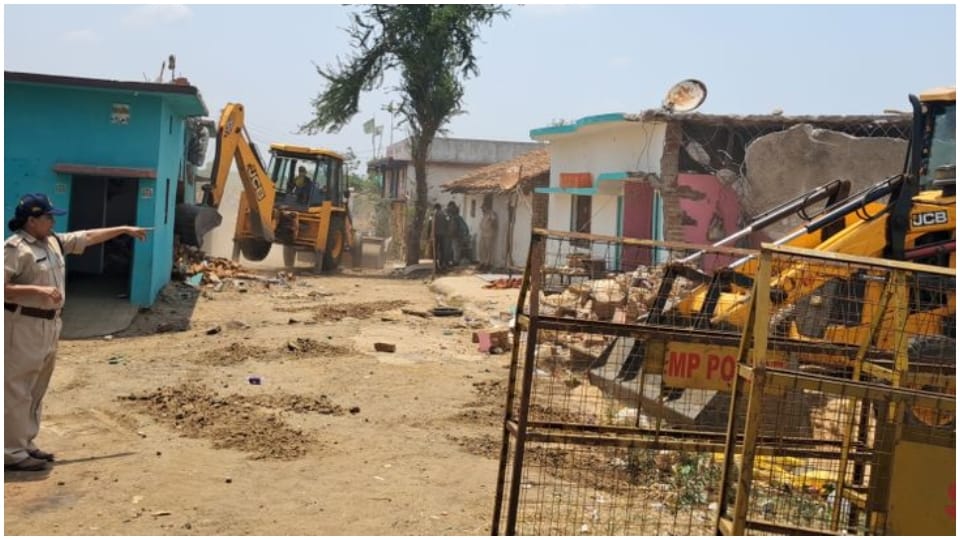 MP Mandla News Bulldozer Action after Cow Remains Found in Houses Madhya Pradesh Police