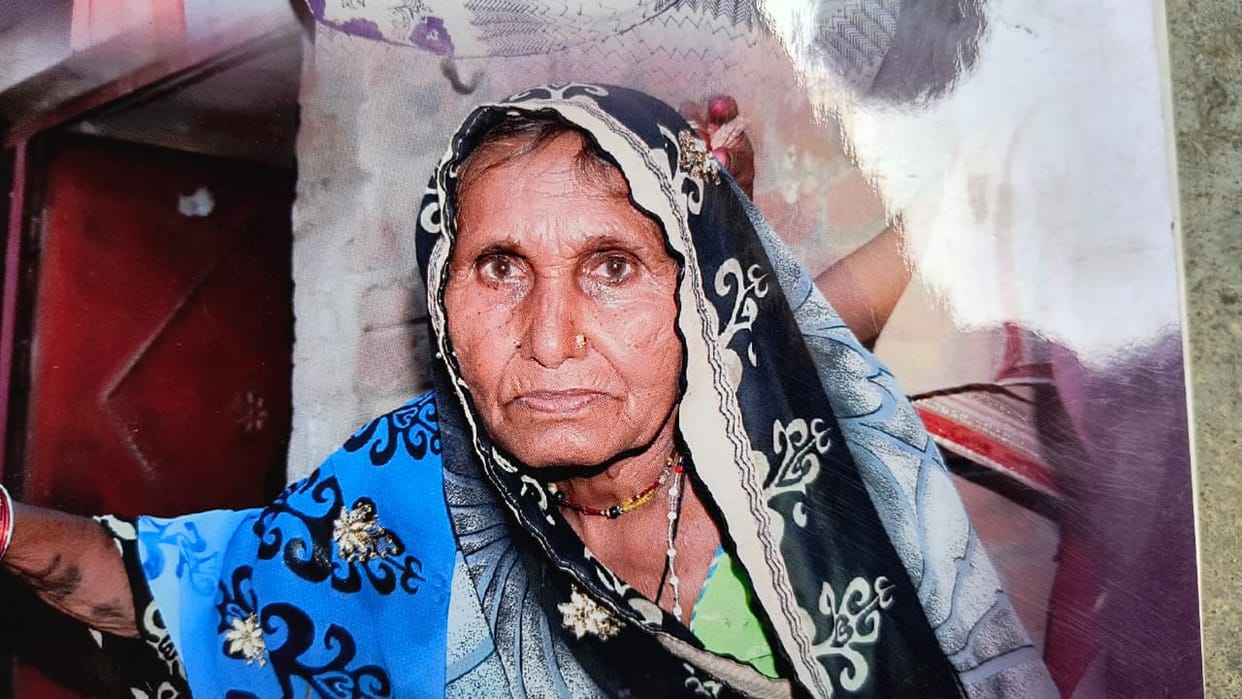 An old woman who went to get food grains was crushed by a truck, the driver left the truck and ran away