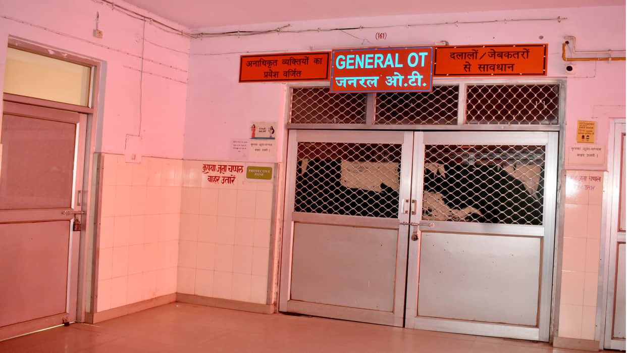 Only two attendants allowed to stay with a patient at the district hospital; entry pass mandatory.