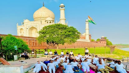 Police officials of Taj Security and Tourism Police Yoga at Dussehra Ghat in Agra on International Yoga Day