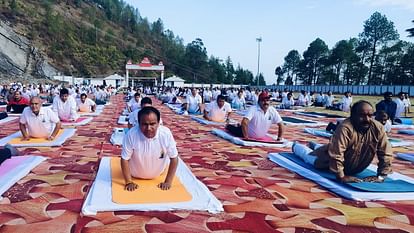 International Yoga Day 2024 Uttarakhand baba Ramdev People including ministers did yoga Watch Photos