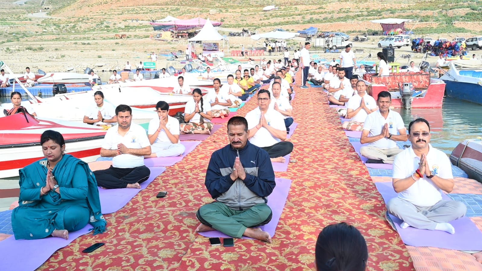 International Yoga Day 2024 Uttarakhand baba Ramdev People including ministers did yoga Watch Photos