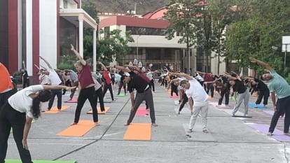 International Yoga Day 2024 Uttarakhand baba Ramdev People including ministers did yoga Watch Photos
