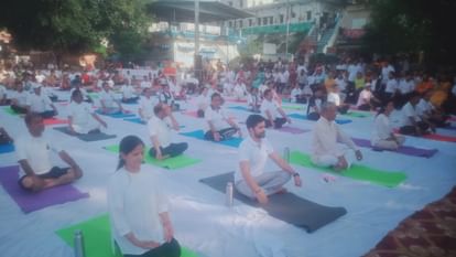 International Yoga Day 2024 Uttarakhand baba Ramdev People including ministers did yoga Watch Photos