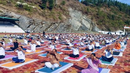 International Yoga Day 2024 Uttarakhand baba Ramdev People including ministers did yoga Watch Photos